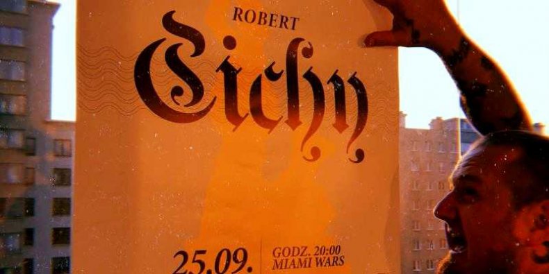 Robert Cichy z plakatem