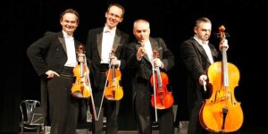 Grupa MoCarta. Od lewej Filip Jaślar, Michał Sikorski, Paweł Kowaluk, Bolesław Błaszczyk. Fot. Paweł Matyka. Źr. Wikimedia